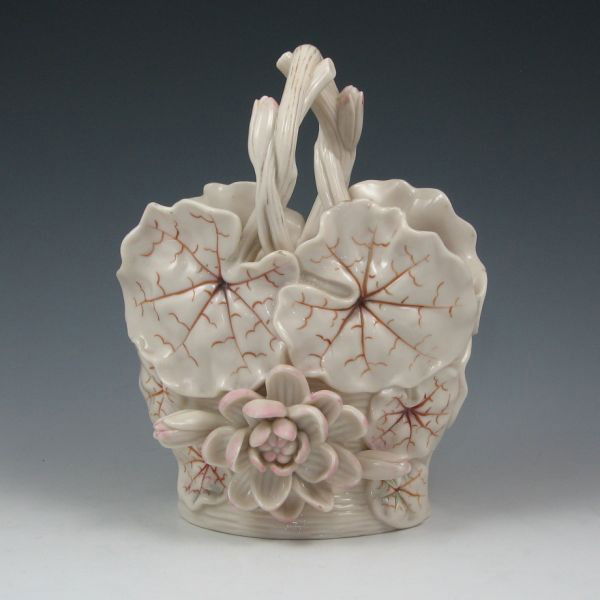 Belleek Lily Basket - 1st Black: Belleek Lily Basket. Marked with black 1st Mark (1863-1890). Aside from a minute nick to the tip of one flower petal, the piece is in excellent condition. 8 1/4" tall.