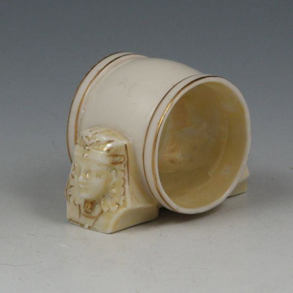 Belleek Egyptian Napkin Holder - 1st Black: Belleek Egyptian napkin holder. Cob Lustre and gilt highlights. Marked with black 1st Mark (1863-1890). A small area on the bottom of one side of the ring has been restored. There is also a broad, fla