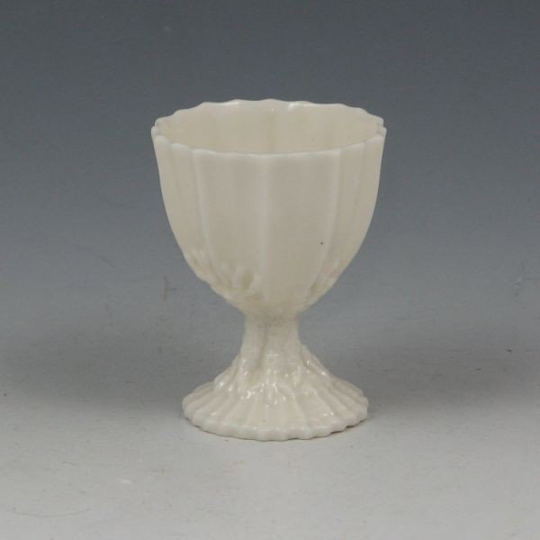 Belleek Egg Cup - 1st Black: Belleek egg cup. Marked with black 1st Mark (1863-1890). Mint with a factory firing flaw to the stem. 2 1/4" tall.