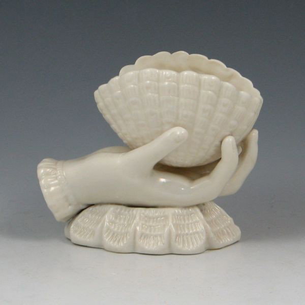 Parian China Hand & Shell Vase: Parian China hand and shell vase. Unmarked. There is a broad chip to the rim. 3 3/8" tall by 4 3/8" wide.