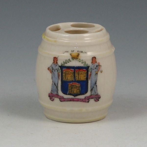 Belleek Crested Dublin Pin Holder - 2nd Black: Belleek Crested City Of Dublin pin or toothpick holder with Cob Lustre highlights. Marked with black 2nd Mark (1891-1926). Small chip to rim. 2 1/8" tall.