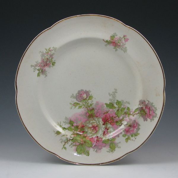 Belleek 10 1/4" Earthenware Plate - 2nd Black: Belleek floral earthenware plate with gold trim. Marked with black 2nd Mark (1891-1926). Small flake and short, tight hairline to rim. 10 1/4" in diameter.