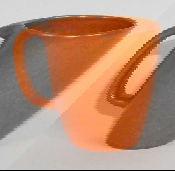 Roseville Raymor 179 Coffee Mug : Roseville Raymor 179 coffee mug in burnt orange. Marked 179 Raymor by Roseville USA. There is a shallow flake to the inside rim that has been touched up. 4 1/8" tall.