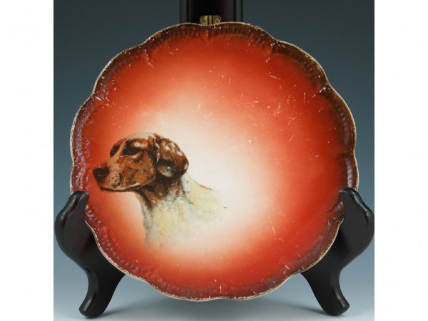 Taylor Smith Taylor English Setter Plate : Taylor Smith Taylor China plate with English setter. Marked with TST China logo circa 1908-1915. Scratches to surface and 1 1/2" line to rim. 7" in diameter.