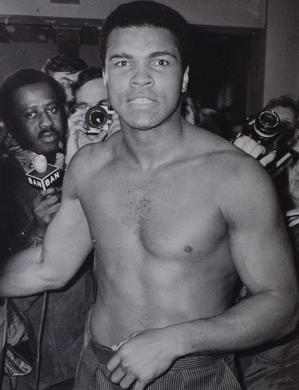 Ali Pose by Unknown Artist - Memorabilia Item - Sports: "Ali Pose" by Unknown Artist - Memorabilia Item - Sports Icons. This Memorabilia Item measures approx. 19H x 15W Inches as shown. This item has been certified authentic and ships with a Certificate of