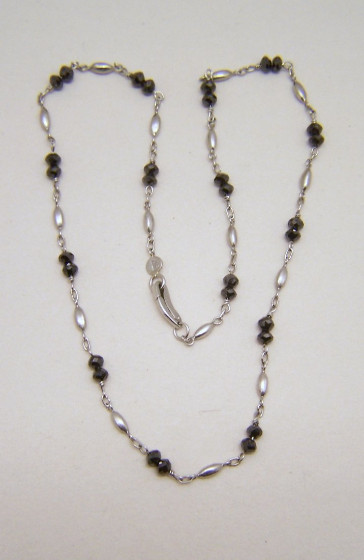 GURHAN 950 platinum black diamond necklace: measures 16 1/8" long, crafted with 4mm black diamonds roundels, weights 7.4 grams, marked pt 950 nz606 & gurhan hallmark. in great condtion.