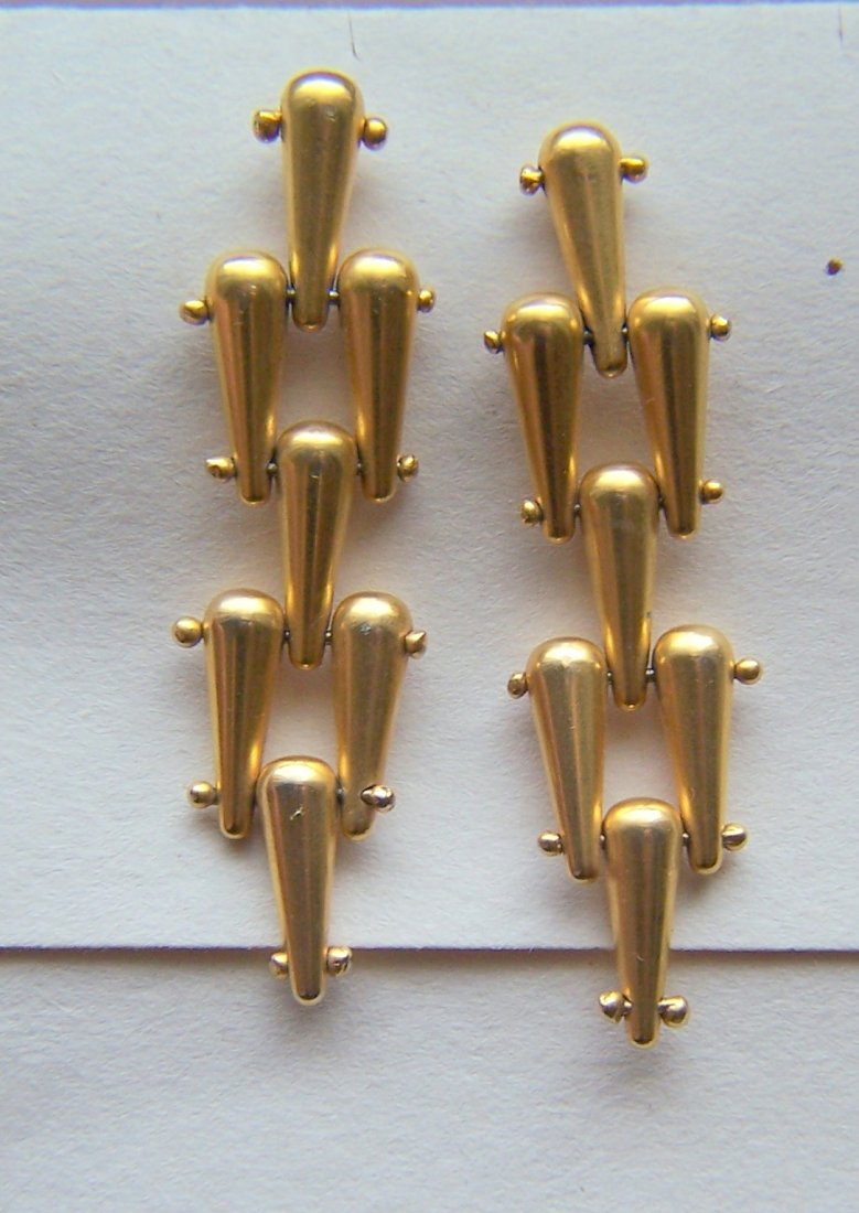 Haute Couture RLM Robert Lee Morris gold tone earrings: measures 2 1/2" long by 11/16" wide, weights 30.2 grams, marked RLM, in good condition with a light wear on the gold.