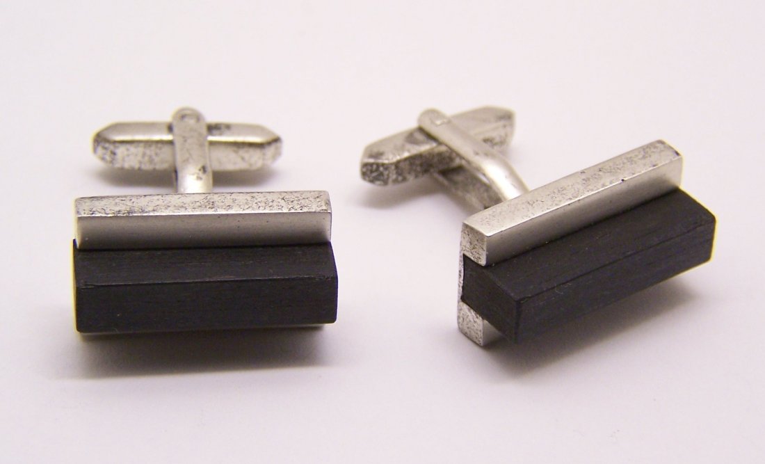 modernist 835 silver ebony wood cufflinks set: top of the cufflinks measures 7/8" long by 1/2" wide, credited with 21x5mm ebony wood, signed 835, weights 18.1 grams, in great condition, need to be polish by the new owner