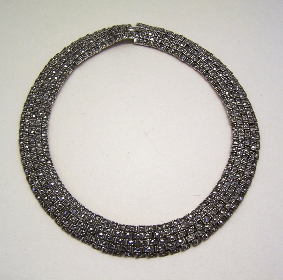 Art Deco marcasite sterling silver choker necklace: measures 15 7/8" long by 11/16" wide, weights 96 grams, crafted with 2mm marcasite, signed 925, in great condition.