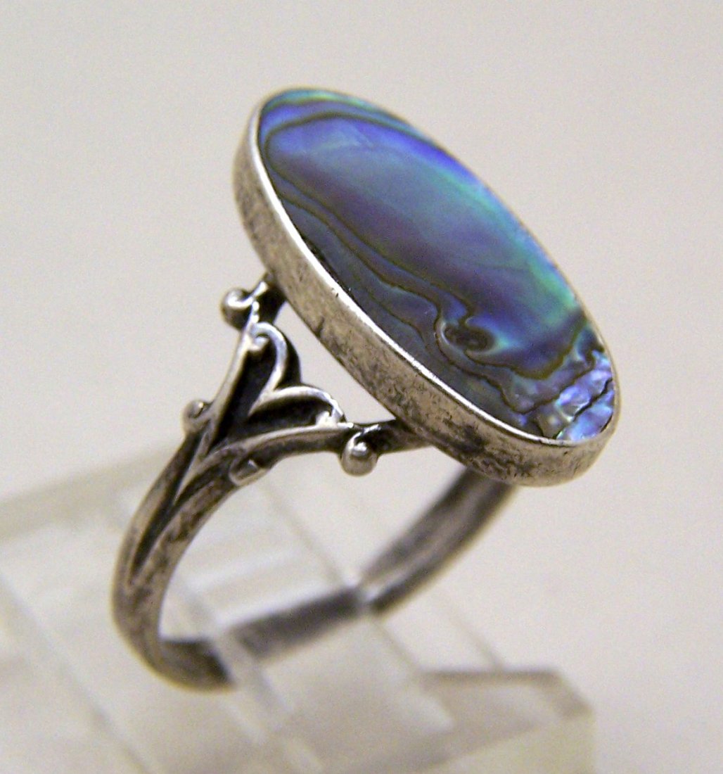 Art Deco sterling silver abalone ring: top of the ring measures 11/16" long by 6/8" wide, crafted with 18x9mm abalone, size 7 1/4, weights 2.9 grams, marked sterling in great condition