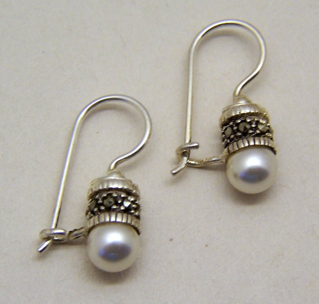 sterling silver marcasite pearl earrings: measures 7/8" long x 2/8" wide,crafted with 5mm faux pearl, weights 4 grams, signed 925 Thailand, in good conditions.