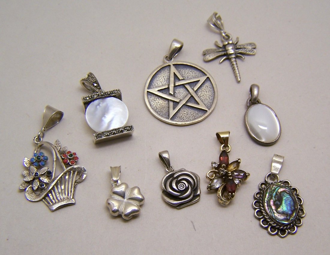 lot of 9 mother pearl garnet marcasite enamel pendant: you are bidding on: 1 1/8" long mother of pearl pendant, 13/16" long flower pendant, 1" long vermeil multi stone pendant, 1 3/8" long flower basket pendant, 1 1/8" long abalone pendant, 1 3/8" long st
