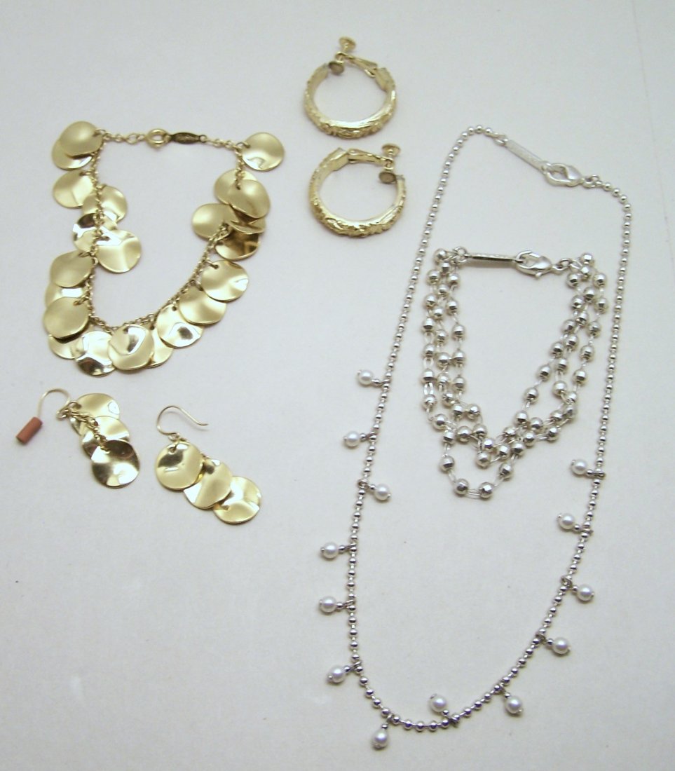 NAPIER silver gold tone earrings bracelet necklace lot: you are bidding on: 1 - 1 1/16" long clip on hoop earring, 1- 1 9/16" long gold tone earrings, 1 - 7 1/2" long silver tone bracelet, 1- 16" long silver tone faux pearl necklace, 1- 7 1/2" long gold to