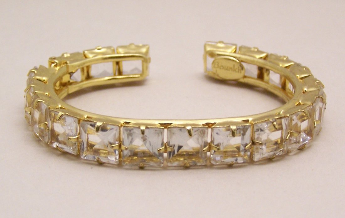 BOUNKIT rock crystal quartz thin cuff bracelet: measure 6" inside circumference by 3/8" wide, crated with 8x8mm rock crystal quartz, weights 25.9 grams, signed Bounkit, in great condition.