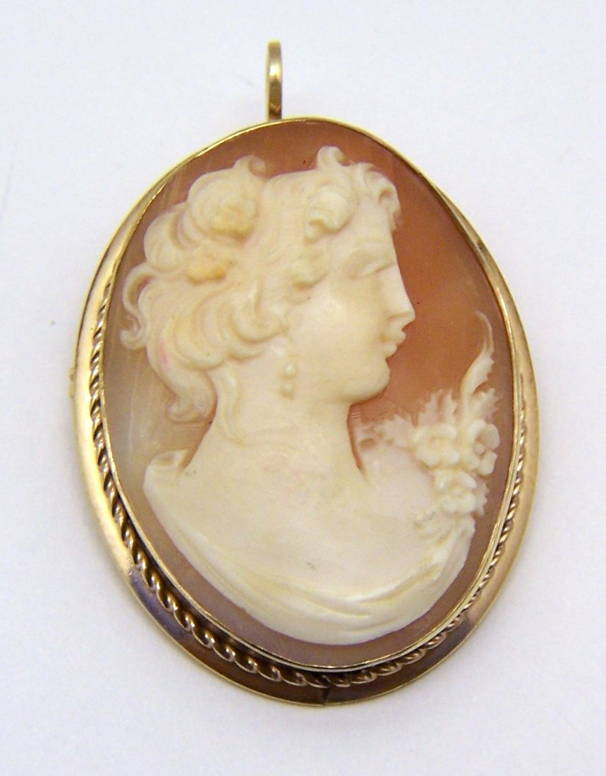 vintage 18k Gf carved shell cameo brooch pin pendant: measures 1 1/2" long by 1" wide, crafted with 28x22mm carved shell cameo, weights 8.1 grams, in great condition, this pendant is unmarked and tested as 18k gold filled.