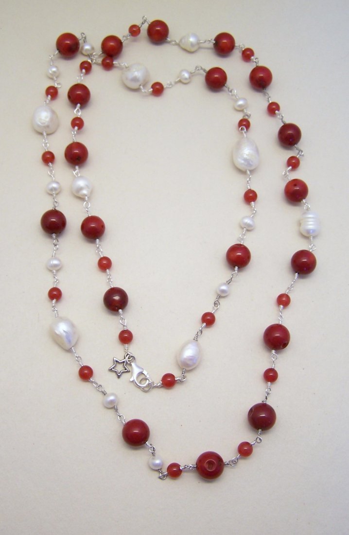 sterling silver coral baroque pearl carnelian necklace: measures 41 3/4" long, crafted with 6mm carnelian beads, 11mm to 12mm coral beads, 6x5mm to 16x12mm south baroque pearl set in sterling silver, weights 71.9 grams, in great condition