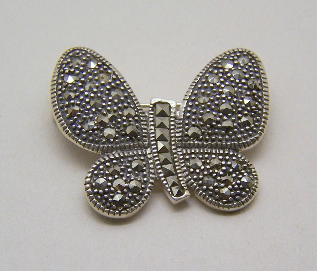 vintage sterling silver marcasite butterfly brooch pin: measures 1 7/16" long by 1 1/8" wide, weights 9.7 grams, marked 925 CA, crafted with marcasite, in great condition