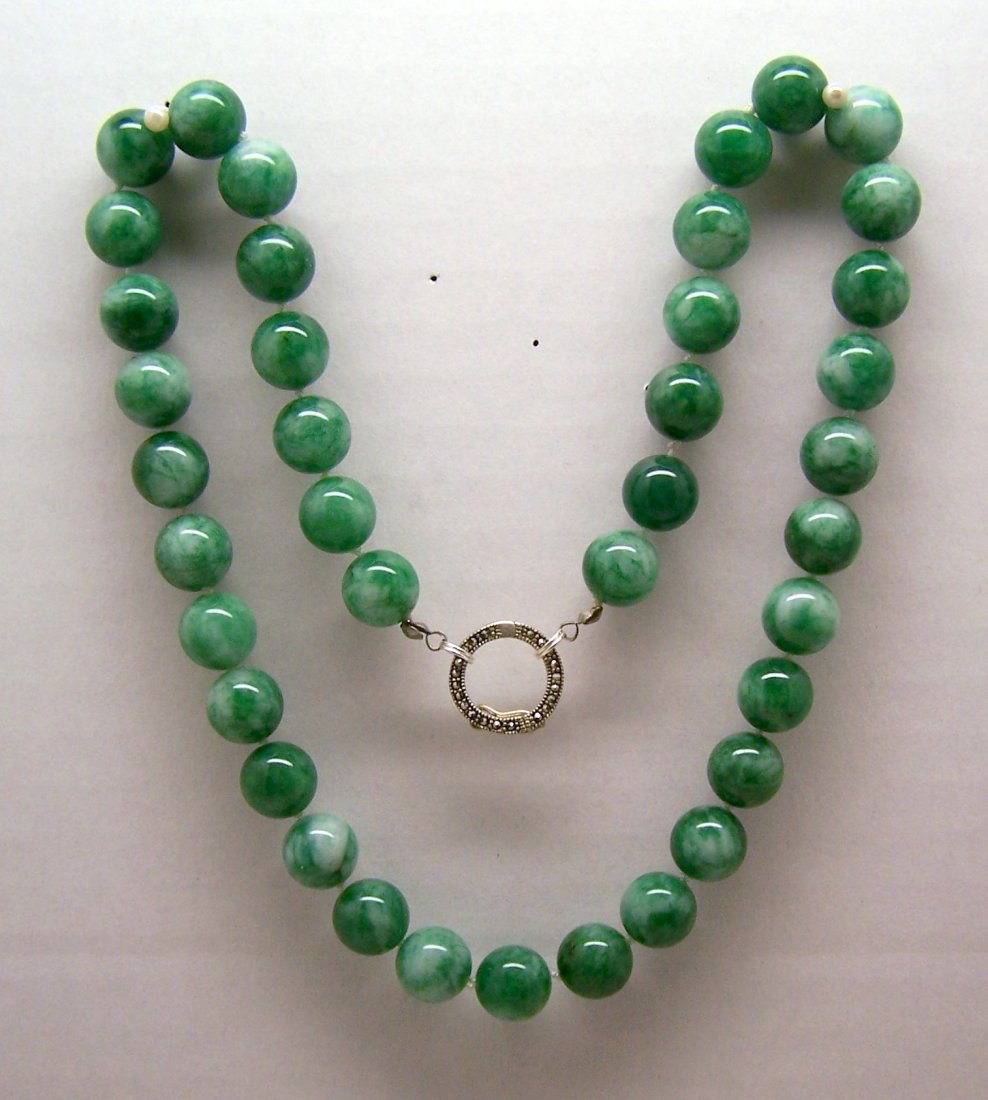 sterling silver marcasite Jade beads necklace: measures 21 1/2" long, crafted with 12mm Jade beads & 11/16" round shape marcasite clasp, weights 97.20 grams, signed 925, in great condition.