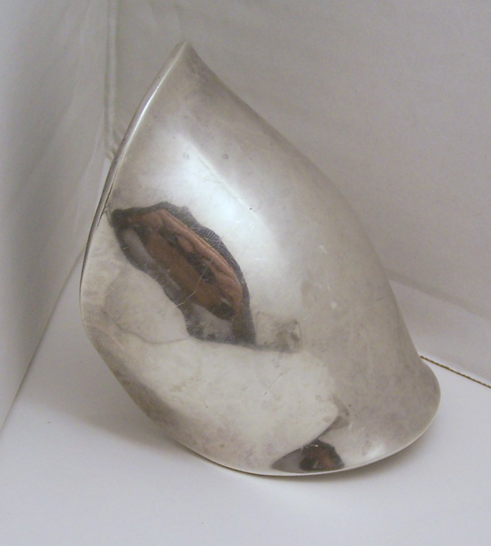 Robert Lee Morris huge sterling silver cuff bracelet: bracelet can fit a 6 1/2" to 8" wrist by 3 7/8" wide, weights 108.55 grams, signed 925 RLM, in good condition, note due the high polish on this bracelet you can see scratches from normal wear but does