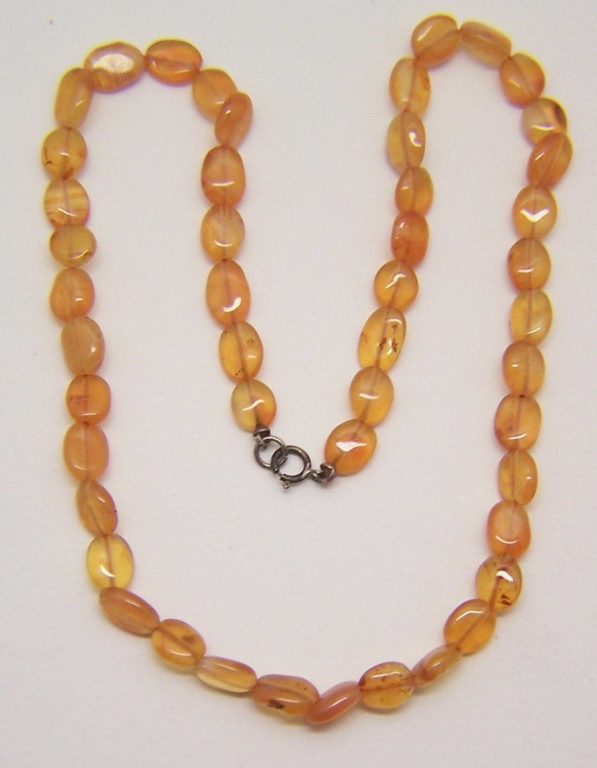 vintage Chinese carnelian sterling silver necklace: measures 15 1/4" long you can add a chain to make it longer, crafted with 7mm to 9mm carnelian beads, weights 13.63 grams, in great condition
