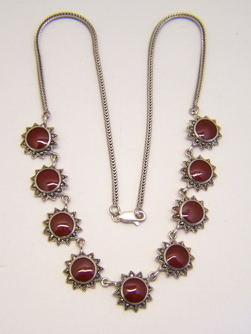 sterling silver red enamel marcasite necklace: measures 16 7/8" long each disk measures 9/16" wide, weights 18.41 grams, signed 925 & tested for sterling silver , in great condition.