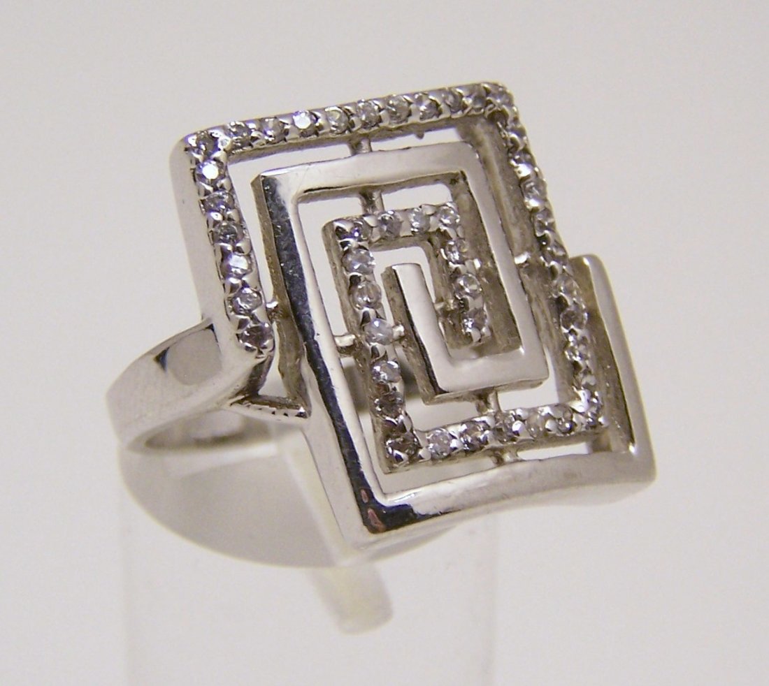 modernist sterling silver white sapphire ring sz 9 3/4: top of the ring measures 7/8" long by 13/16" wide, size 9 3/4, weights 7.4 grams, marked 925, in great condition