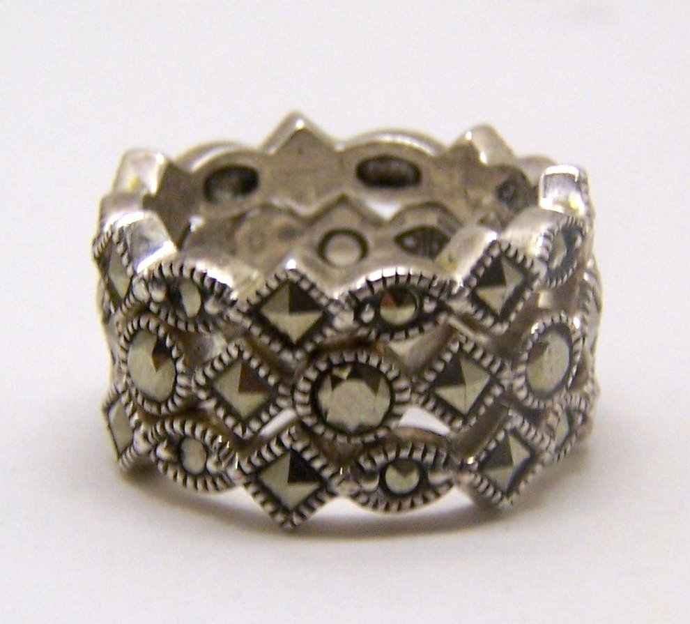 set of 3 JUDITH JACK sterling silver marcasite ring: each ring measures approximately 3/16" wide, size 6, weights 11.2 grams, signed JJ for Judith jack, in great condition