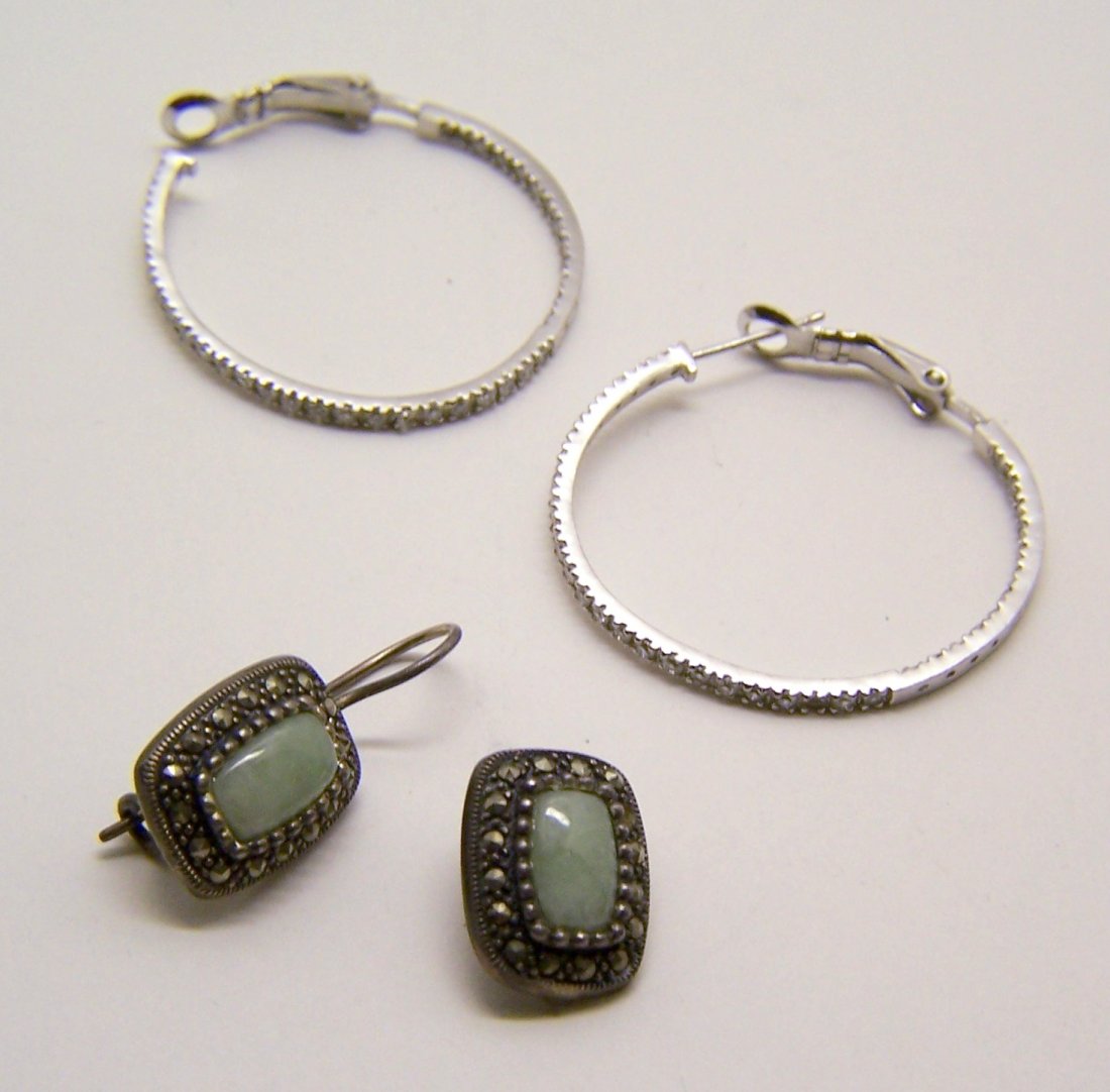 2 pair of sterling silver jade Cz marcasite earrings: you are bidding on : 1 pair of sterling silver jade marcasite earrings measures 1 1/16" long, french wire broken, 1 pair of sterling silver Cz hoop earrings measures 1 5/16" long, ear post broken, com