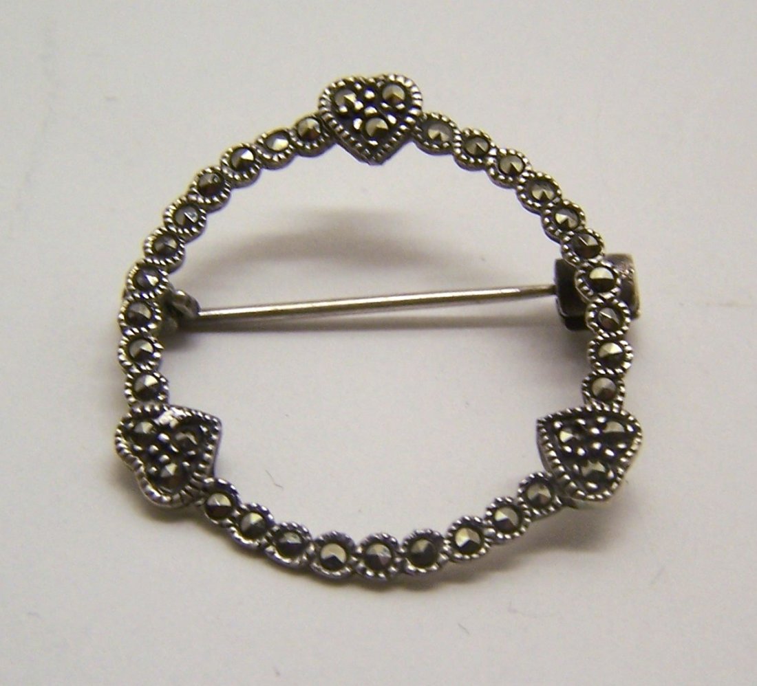 sterling silver marcasite brooch pin: measures 1 3/16" long by 1 1/8" wide, weights 3 grams, in great condition