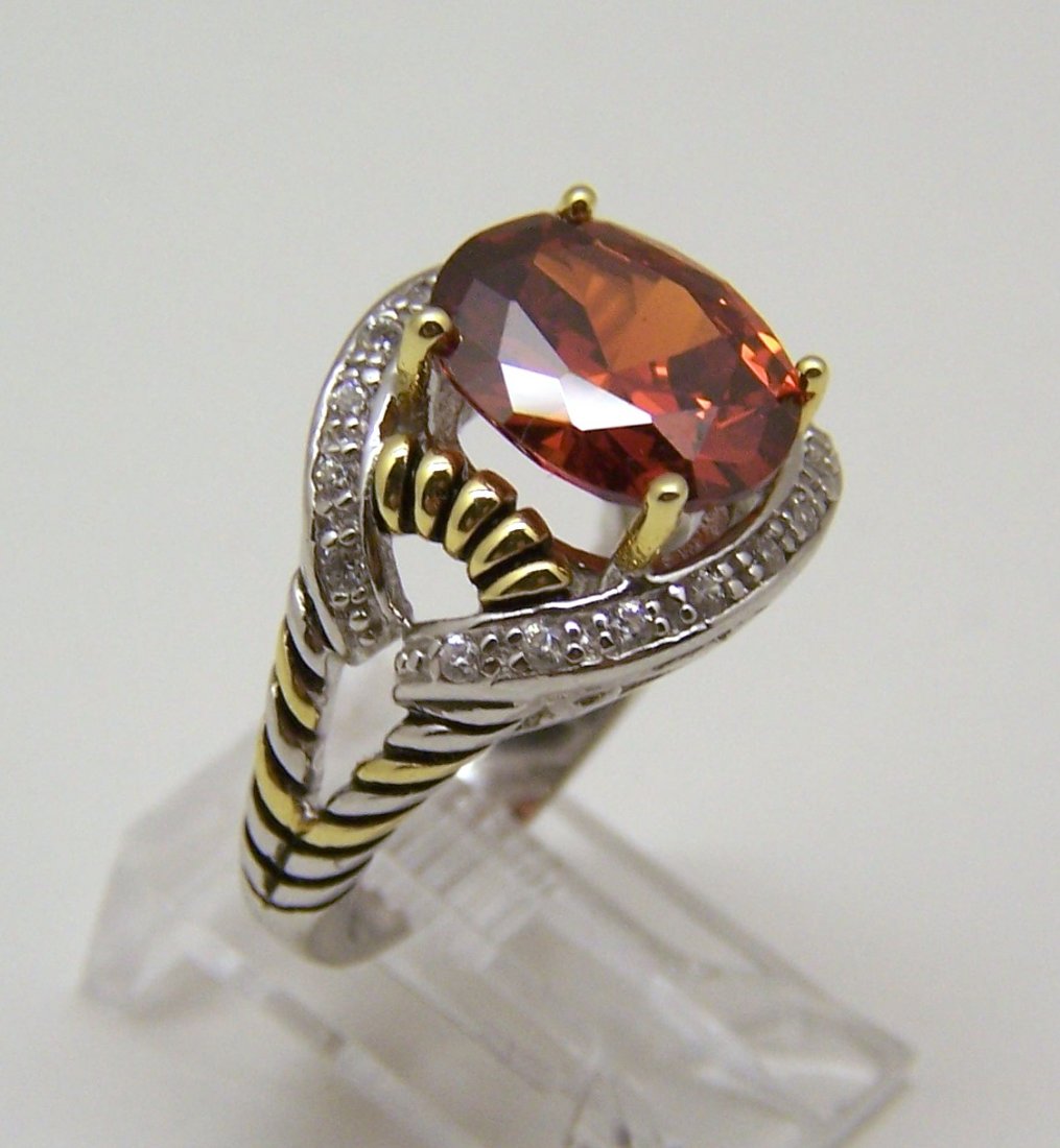 sterling silver 14k diamond topaz ring: top of the ring measures 5/8" wide, crafted with 12x9mm topaz & diamonds chips, size 6 ,weights 7.61 grams, signed 925 14k Italy, in great condition