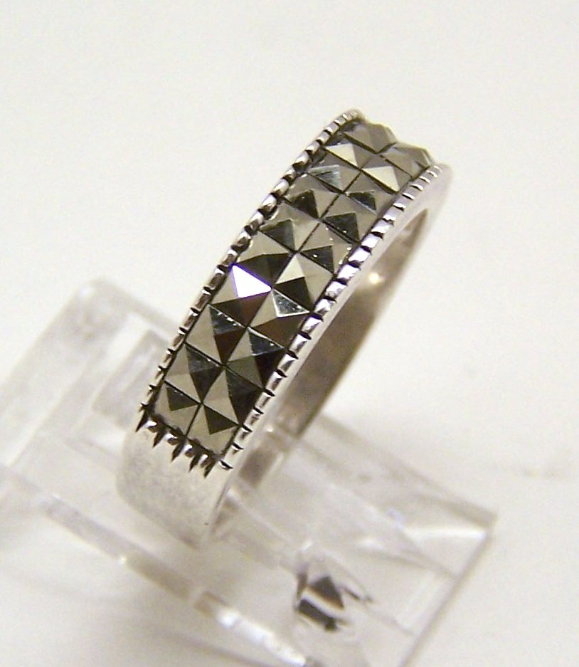 DBJ sterling silver marcasite ring: top of the ring measures 2/8" wide, size 8 1/4, weights 3.79 grams, DBJ 925, in great condition just need to be polish