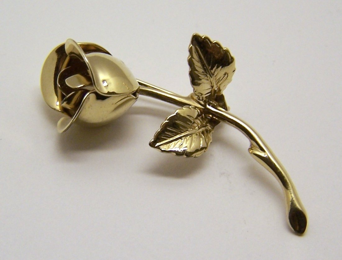 vintage MONET gold tone rose brooch pin: measures 1 7/8" long by 9/16" wide, weights 4.9 grams, signed Monet, in great condition.