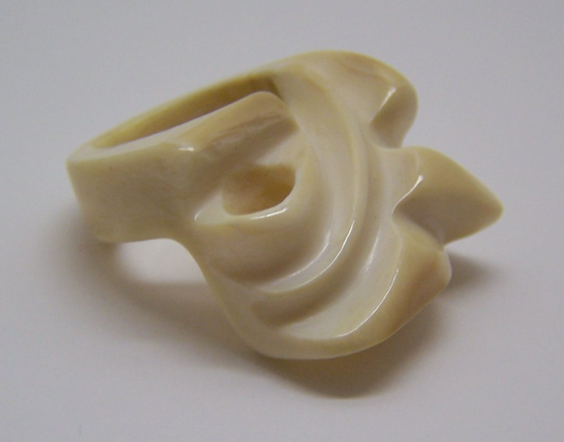 rare museum quality carved ivory ring: top of the ring measures 1 3/16" long by 13/16" wide, size 8 1/4, weights 11.94 grams, in great condition