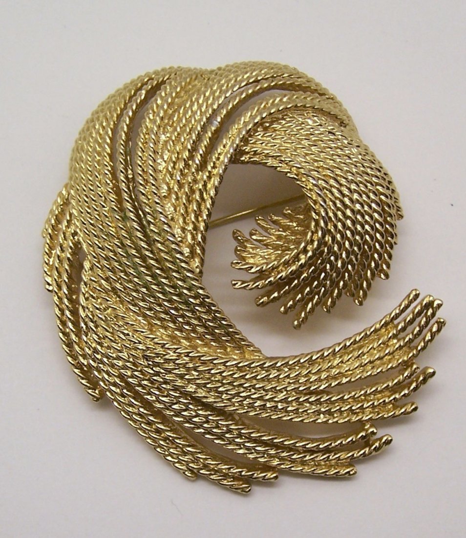 vintage MONET gold tone brooch pin: measures 2 9/16" long by 2" wide, weights 35.5 grams, signed Money, in great condition