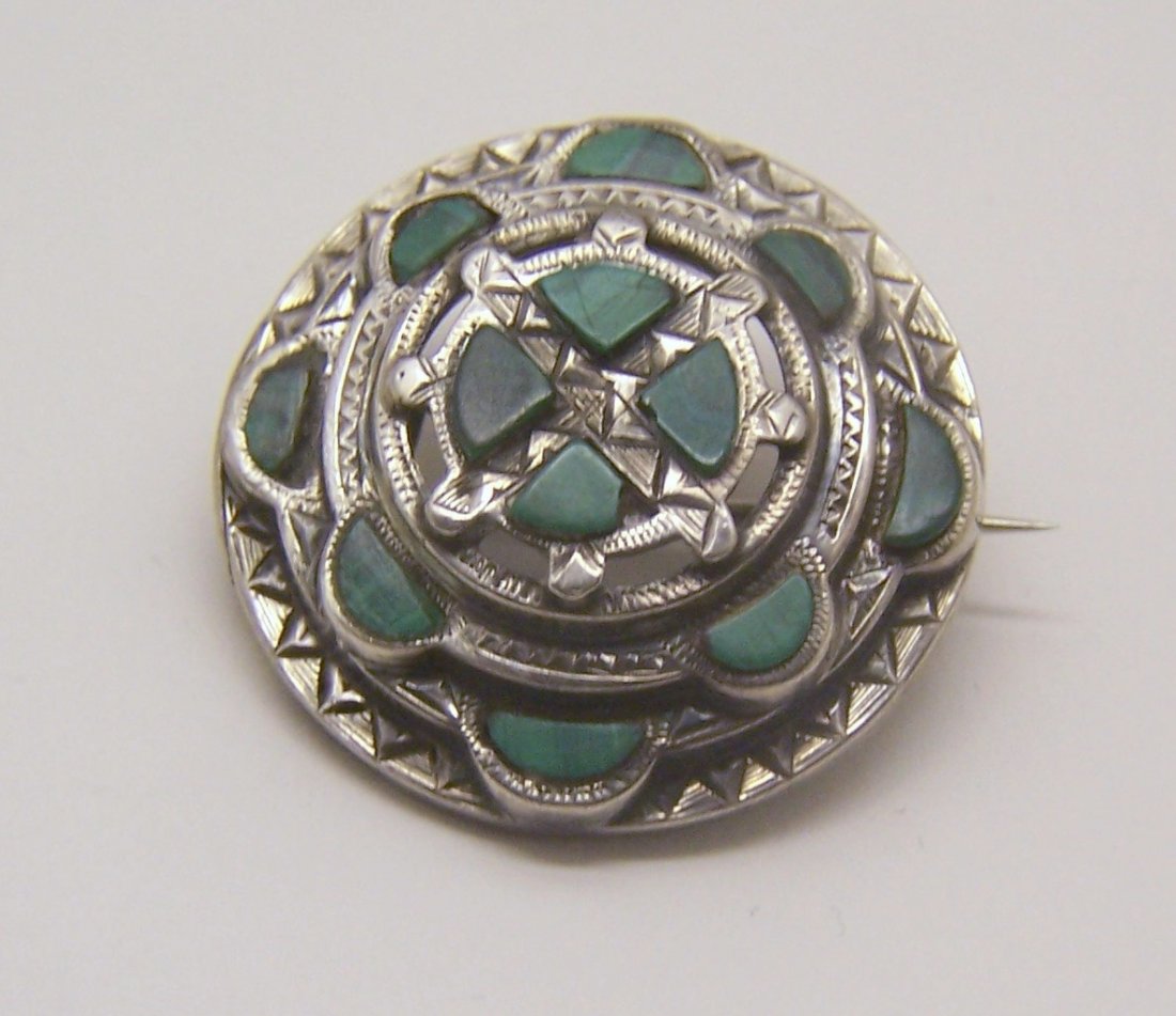 old Scotish sterling silver chalcedony brooch pin: measures 1 1/4" in diameter, crafted with chalcedony, weights 8.7 grams, in great condition