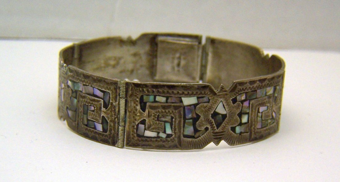 Taxco Mexico abalone bracelet: measures 7" long by 5/8" long, weights 22 grams, in good condition, just need to be polish as you desire