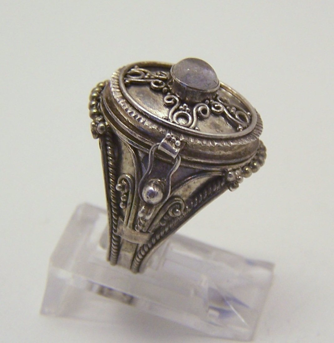 vintage sterling silver moonstone poison ring: top of the ring measures 13/16" wide, crafted with 4mm moonstone, weights 5.5 grams, size 5, in great condition