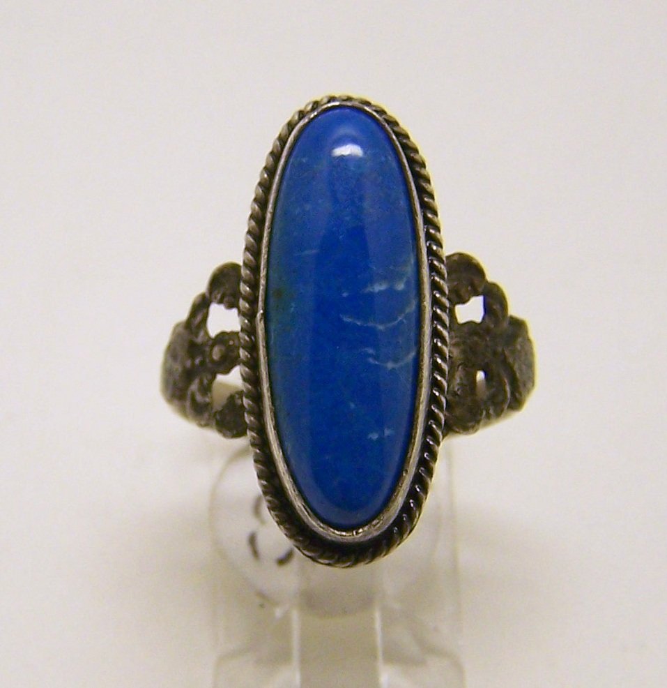 vintage sterling silver howlite turquoise ring: top of the ring measures 1" wide, crafted with 21x6mm howlite turquoise, size 7 3/4, weights 5.2 grams, good condition
