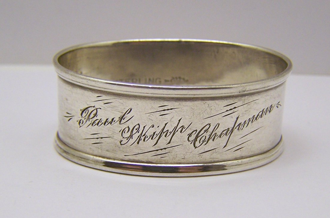 WEBSTER CO sterling silver napkin ring: measures 2" long by 1 9/16" wide & 3/4" high, engrave it Paul skipp chapman October 15, 1933, sterling makers hallmark, weights 9.8 grams, in good condition.
