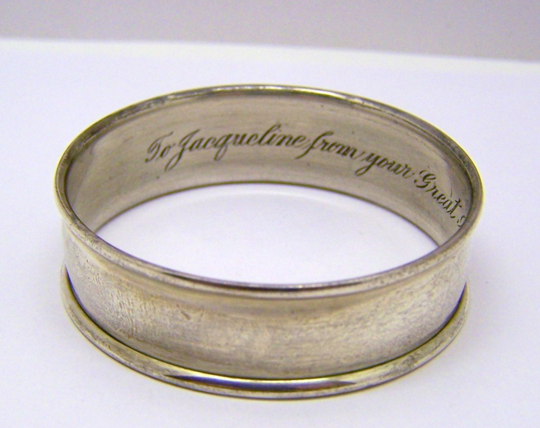 WATROUS MFG CO sterling silver napkin ring: measures 1 13/16" wide & 9/16" high, engrave it To Jacqueline drom your great aunt tone dec. 25,1941, sterling makers hallmark 100, weights 12.2 grams, in good condition.