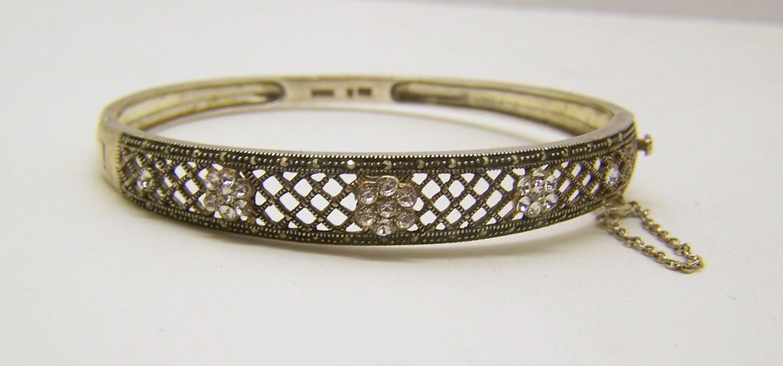 sterling silver crystal marcasite bangle bracelet: measures 7 5/16" inside circunference by 7/16" wide, weights 19 grams, crafted with crystals & marcasites, in good condition