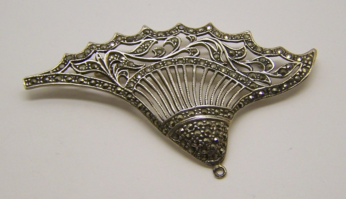 sterling silver marcasite brooch pin: measures 3 1/16" long by 1 6/8" wide, weights 12.2 grams, in good condition