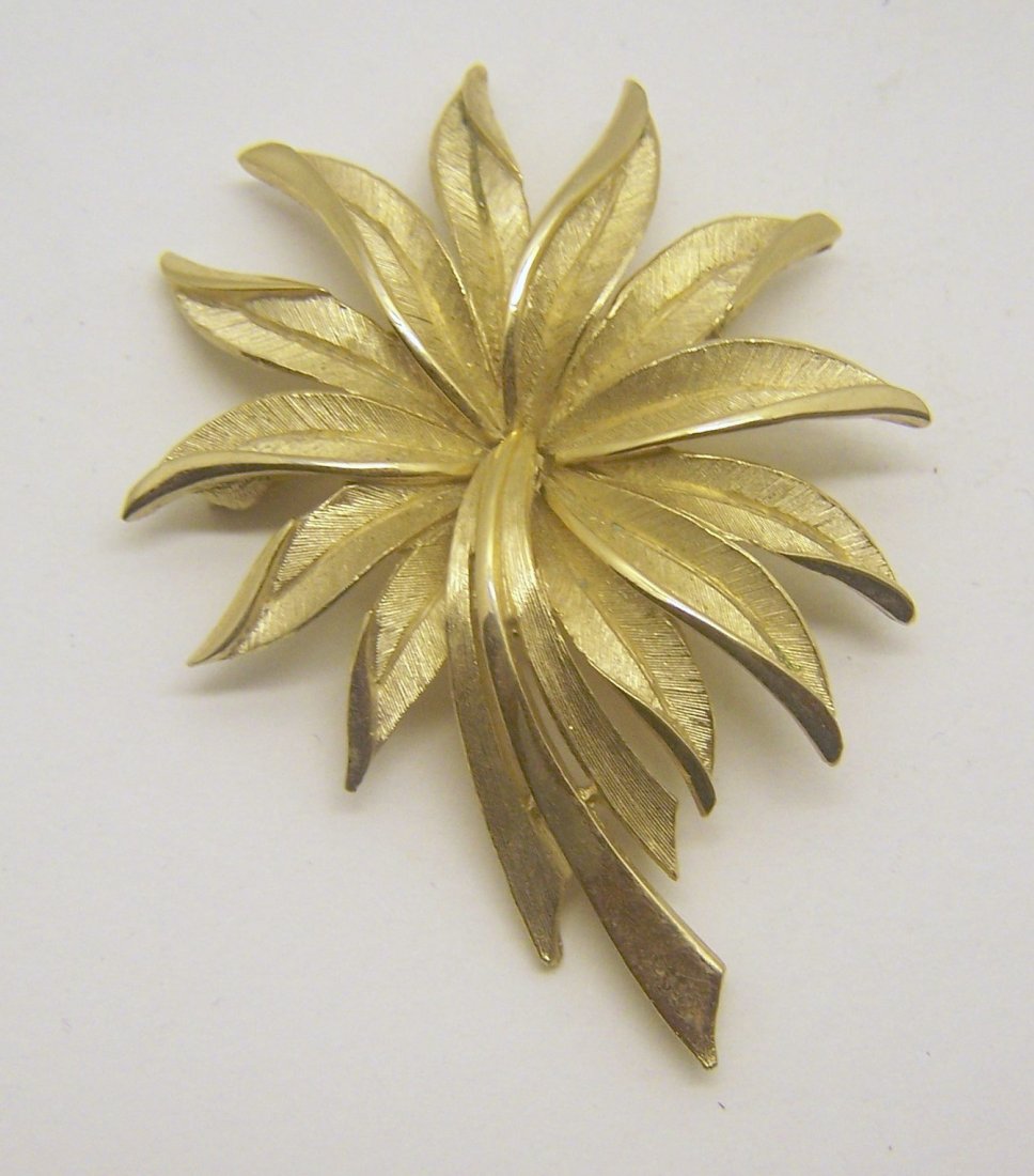 TRIFARI gold tone brooch pin: measures 2 7/16" long by 1 13/16" wide, weights 16.69 grams, signed Trifari in good condition
