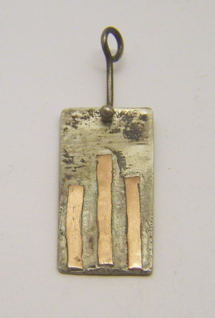 handcrafted CF sterling copper pendant: measures 1 7/8" long by 5/8" wide, crafted with sterling silver & copper strips, weights 5.72 grams, in good condition