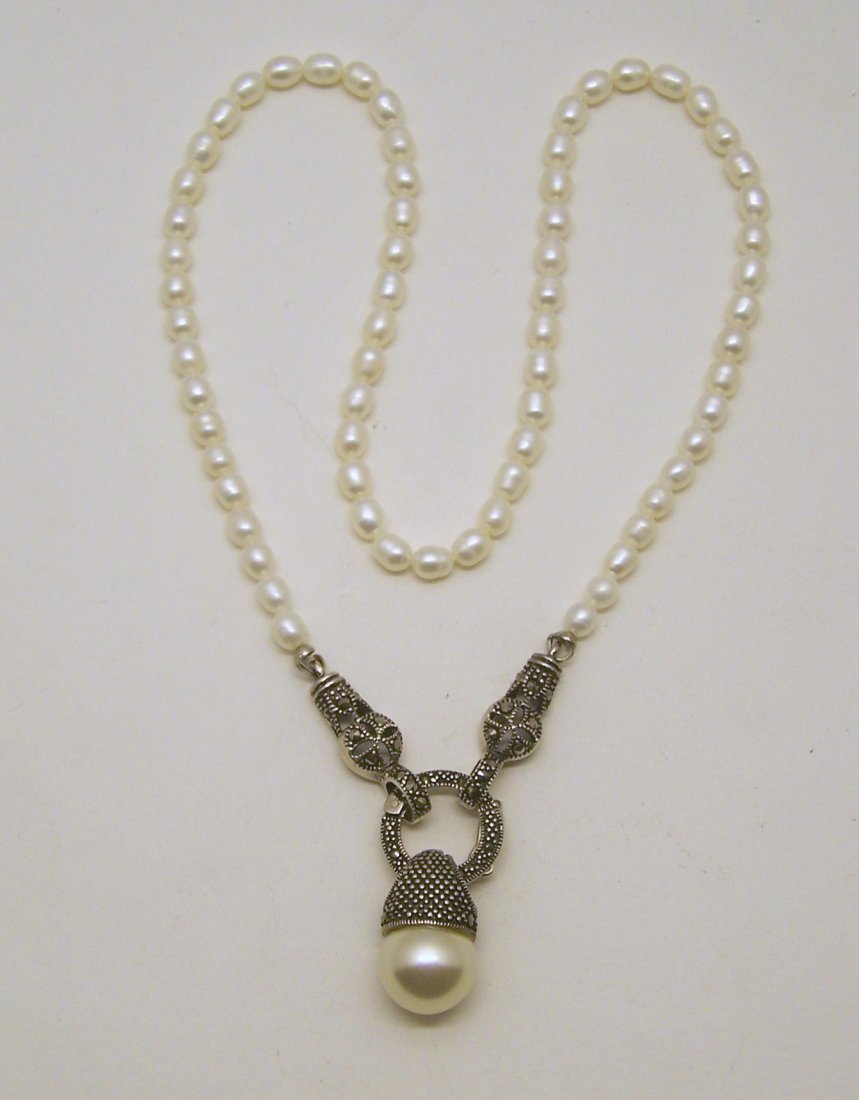 sterling silver marcasite pearl necklace: measures 16 1/8" long, crafted with marcasite & 4mm cultured pearl & 12mm faux pearl on the pendant, weights 17 grams, in good condition