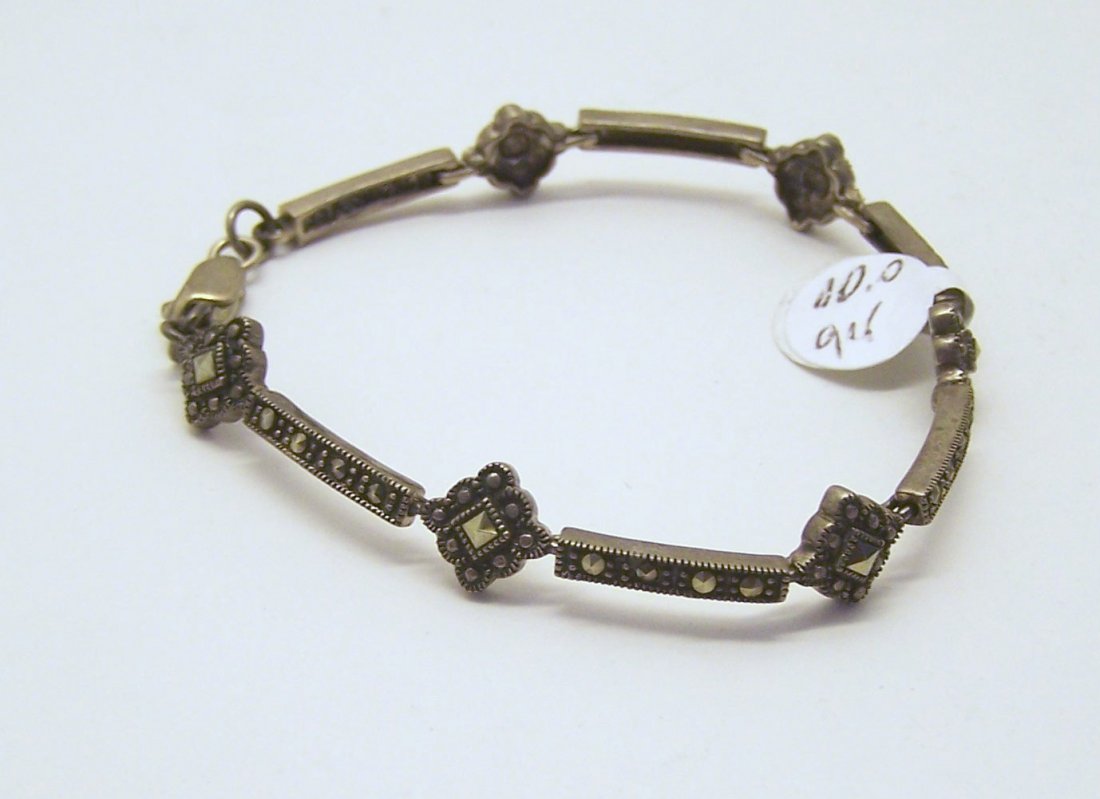 vintage sterling silver marcasite bracelet: measures 7" long by 3/8" wide, weights 9.8 grams, in good condition