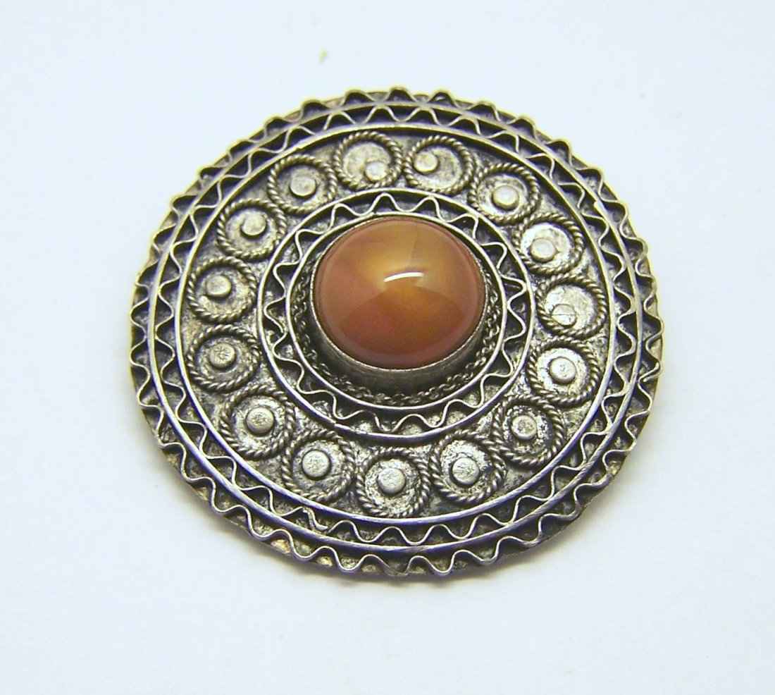 Israeli 935 sterling silver carnelian brooch pin: measures 1 11/16" in diameter, crafted with 12mm carnelian, weights 9.5 grams, in good condition