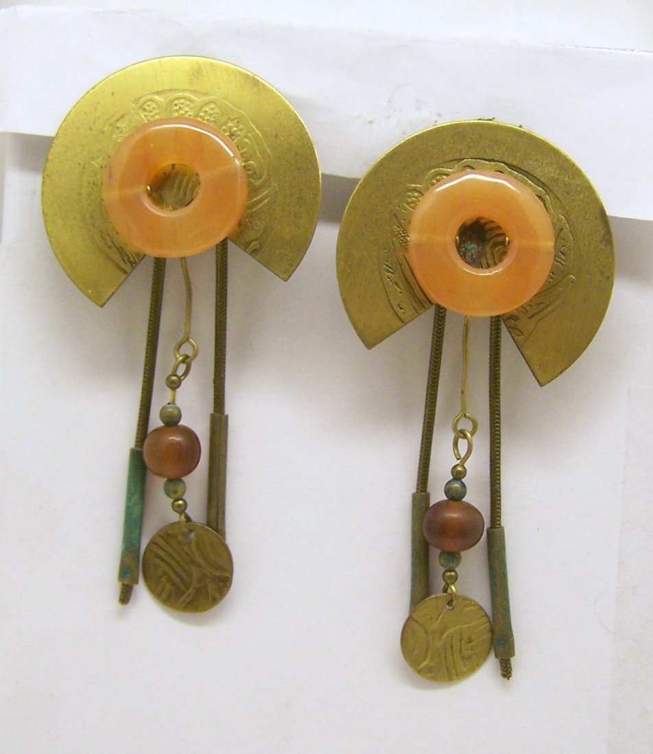 Mid Century brass carnelian amber drop earrings: measures 3 1/16" long by 1 1/2" wide, crafted with 9mm amber & 20mm carnelian, weights 25.2 grams, in good condition, the earrings are clip on.