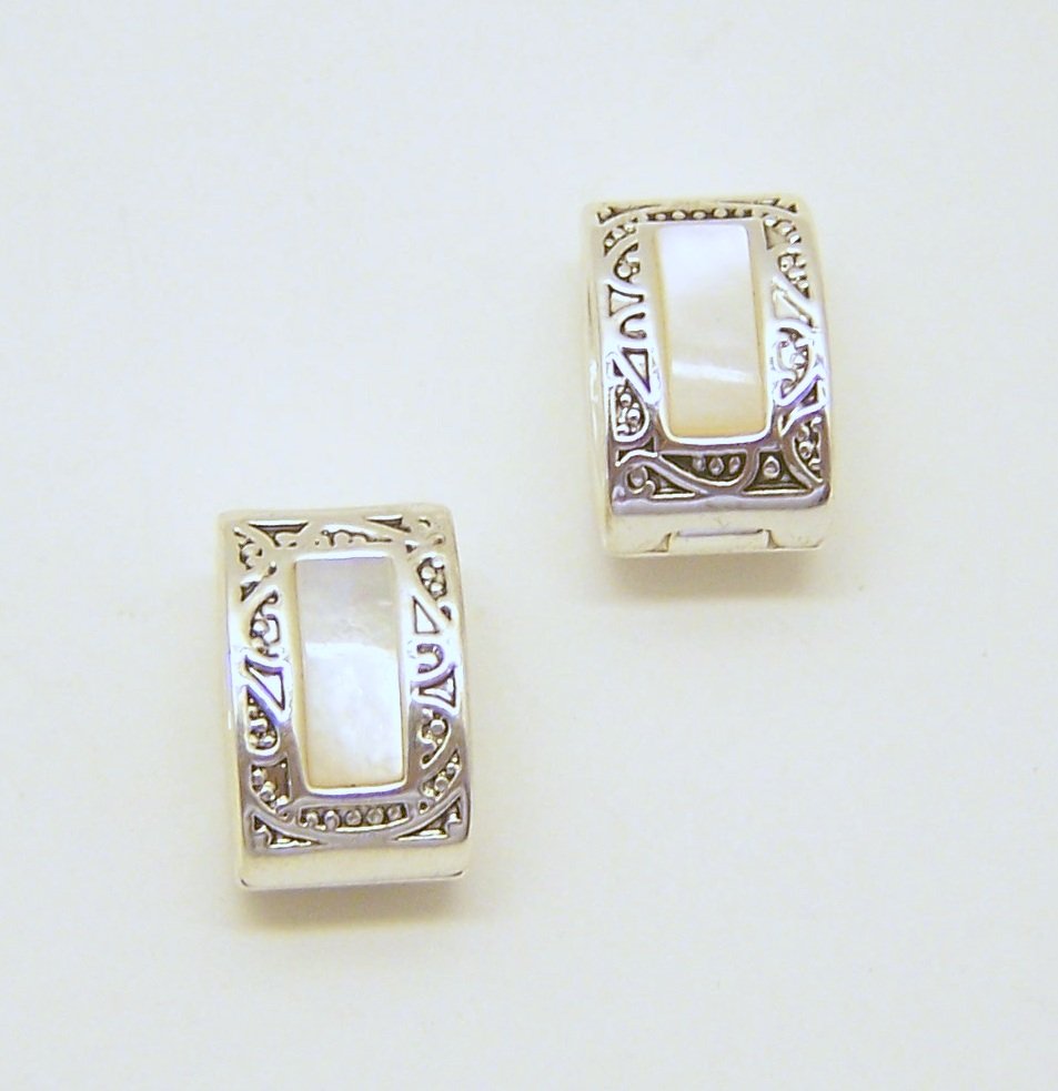 MONET silver tone mother of pearl clip on earrings: measures 5/8" long by 3/8" wide, weights 13.8 grams, in great condition