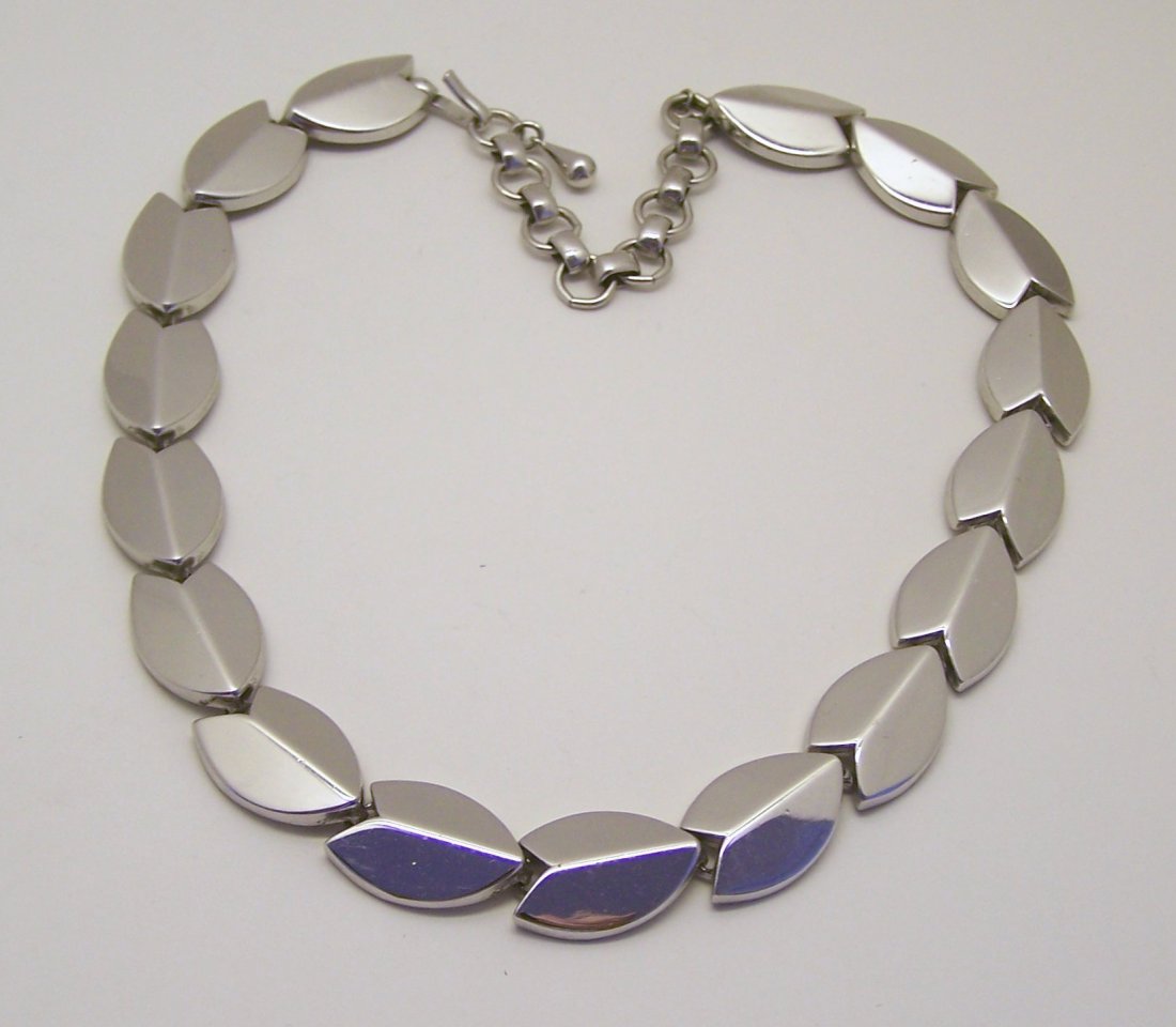 MONET silver tone necklace: measures 17 1/4" long by 5/8" wide, weights 104 grams, in great condition